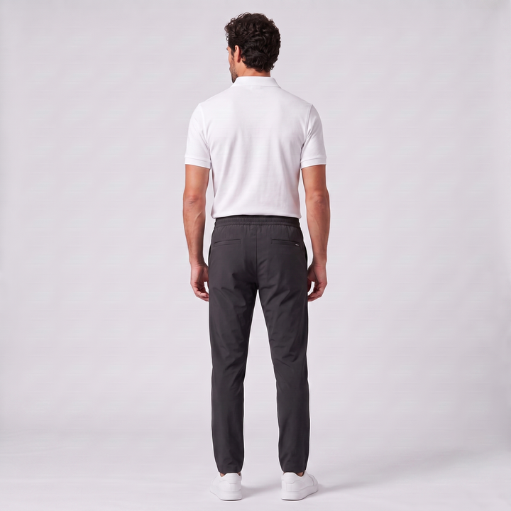 Gładkie spodnie męskie z elastycznym pasem i bocznymi kieszeniami
